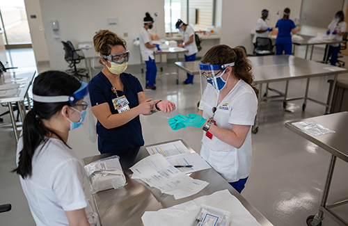 Nursing students in a skills lab