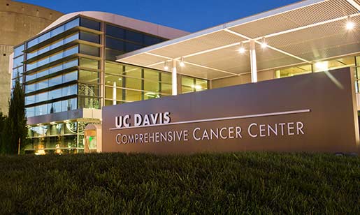 The UC Davis Cancer Center signage showing comprehensive designation