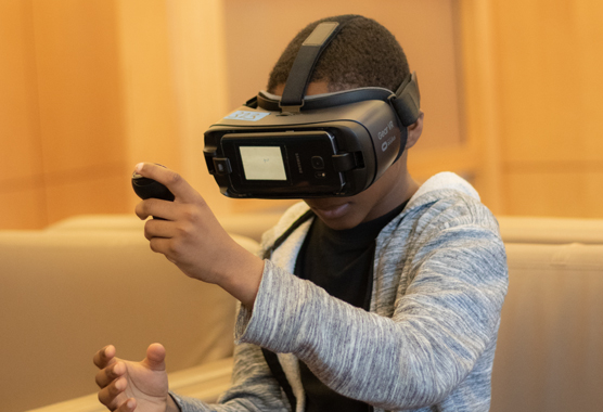 a boy using virtual reality