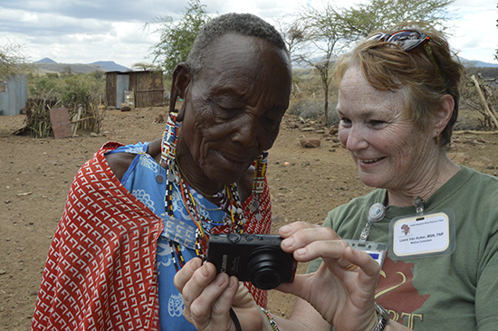 Kenya Van Aukern showing photos to her friend